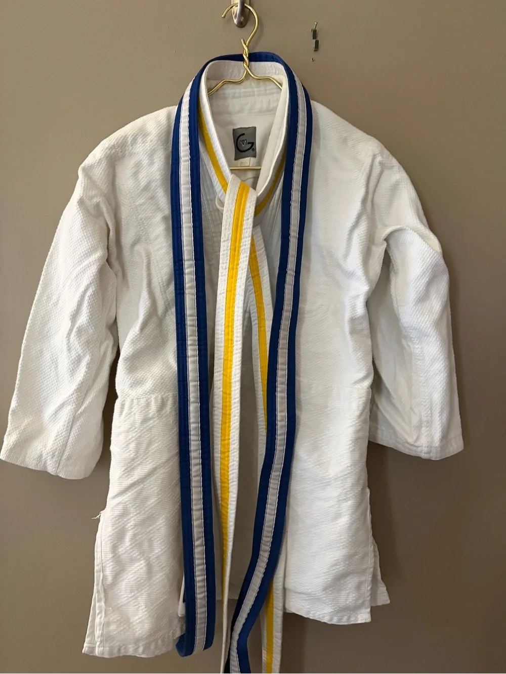 White Martial Arts Gi Jacket with Blue & Yellow Trim -